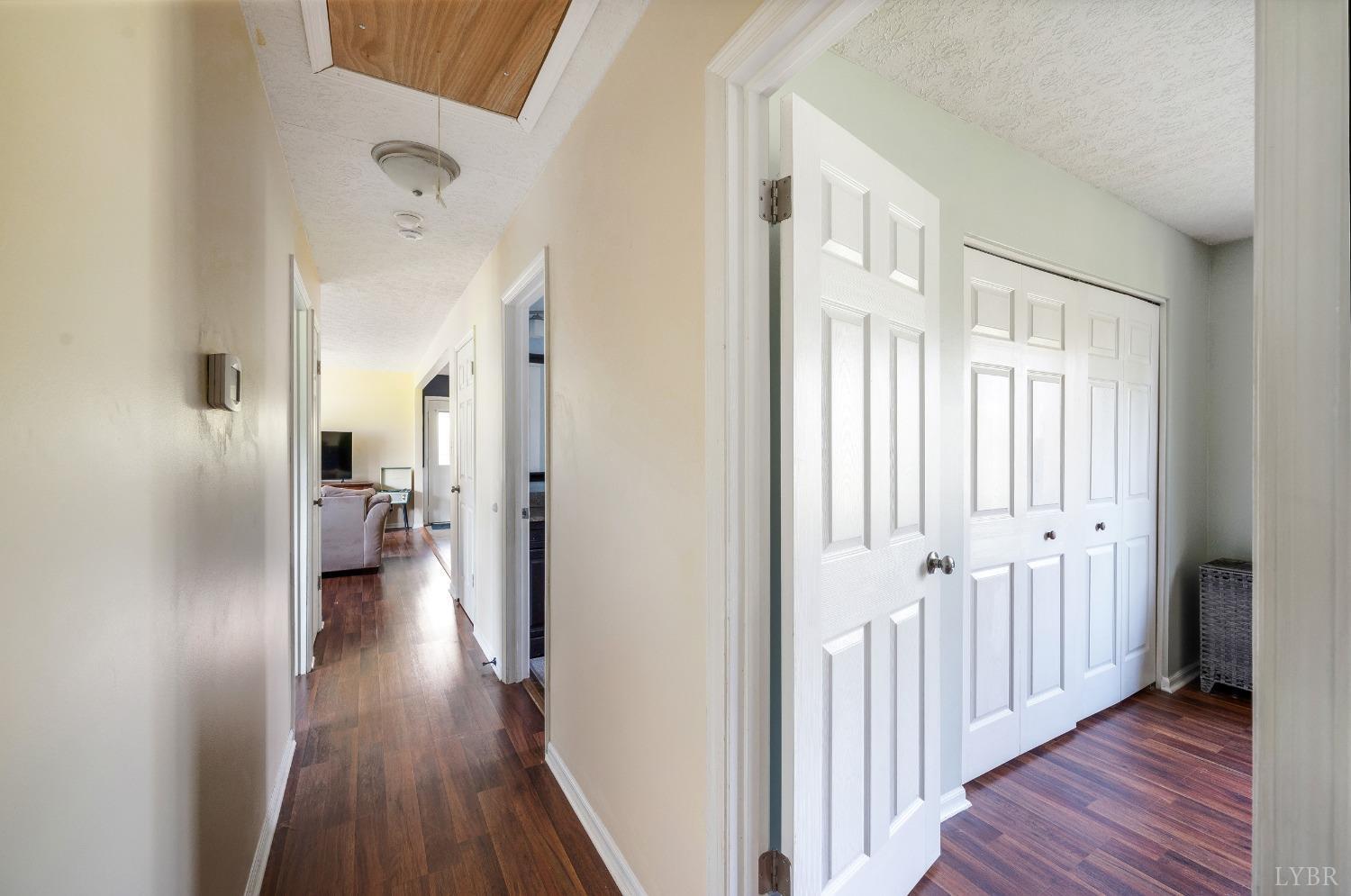 503 Sweeney Circle Forest, VA 24551 - Photo 18 of 50 a view of a hallway with wooden floor and staircase