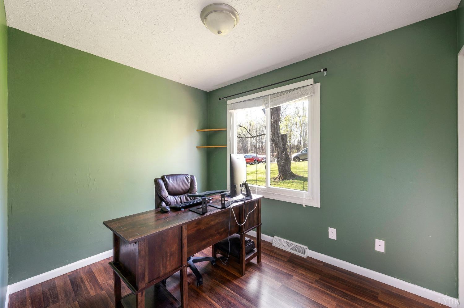 503 Sweeney Circle Forest, VA 24551 - Photo 19 of 50 a view of a workspace with furniture and a window
