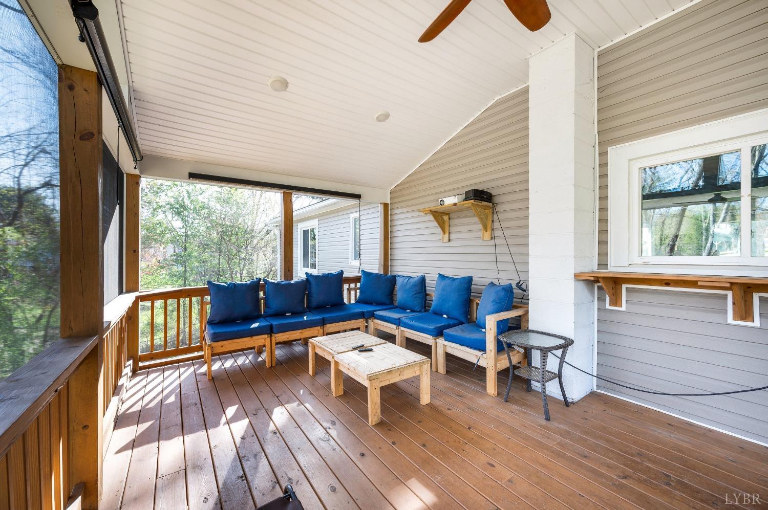503 Sweeney Circle Forest, VA 24551 - Photo 26 of 50 a balcony with wooden floor table and chairs