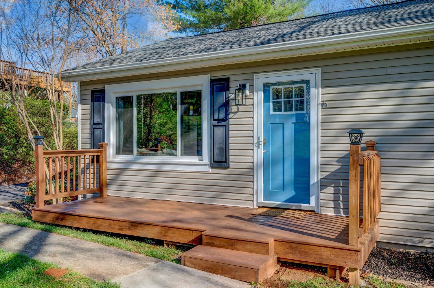 503 Sweeney Circle Forest, VA 24551 - Photo 3 of 50 a view of house with wooden deck and a yard