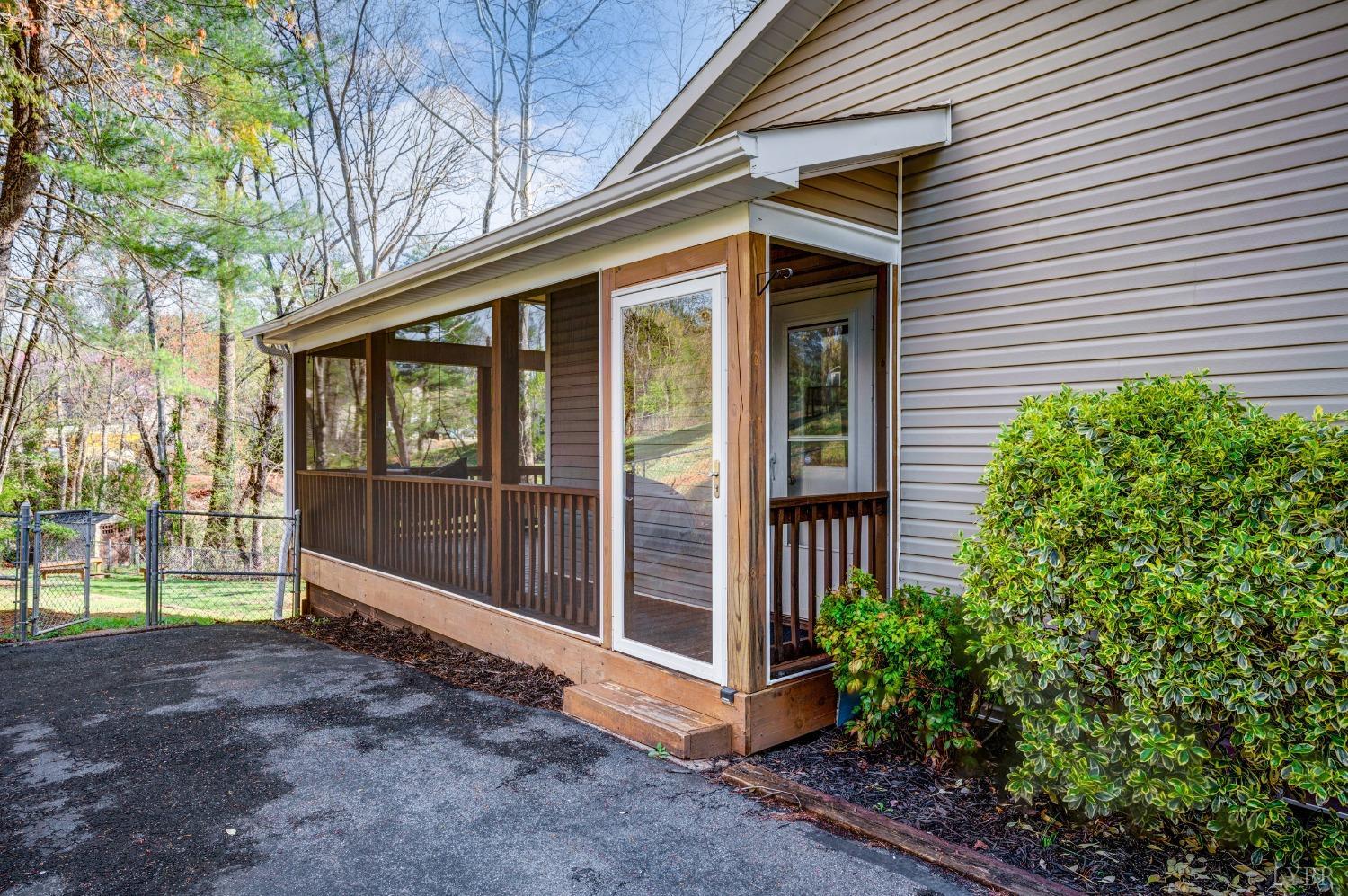 503 Sweeney Circle Forest, VA 24551 - Photo 36 of 50 a view of a house with a yard and potted plants