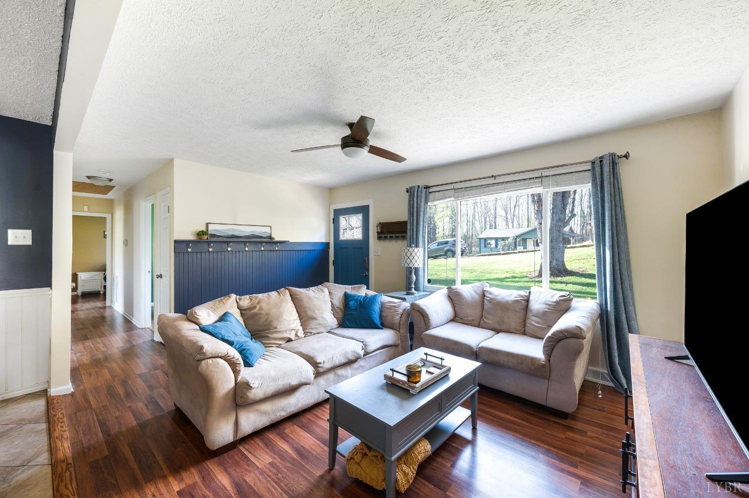 503 Sweeney Circle Forest, VA 24551 - Photo 6 of 50 a living room with furniture and a flat screen tv