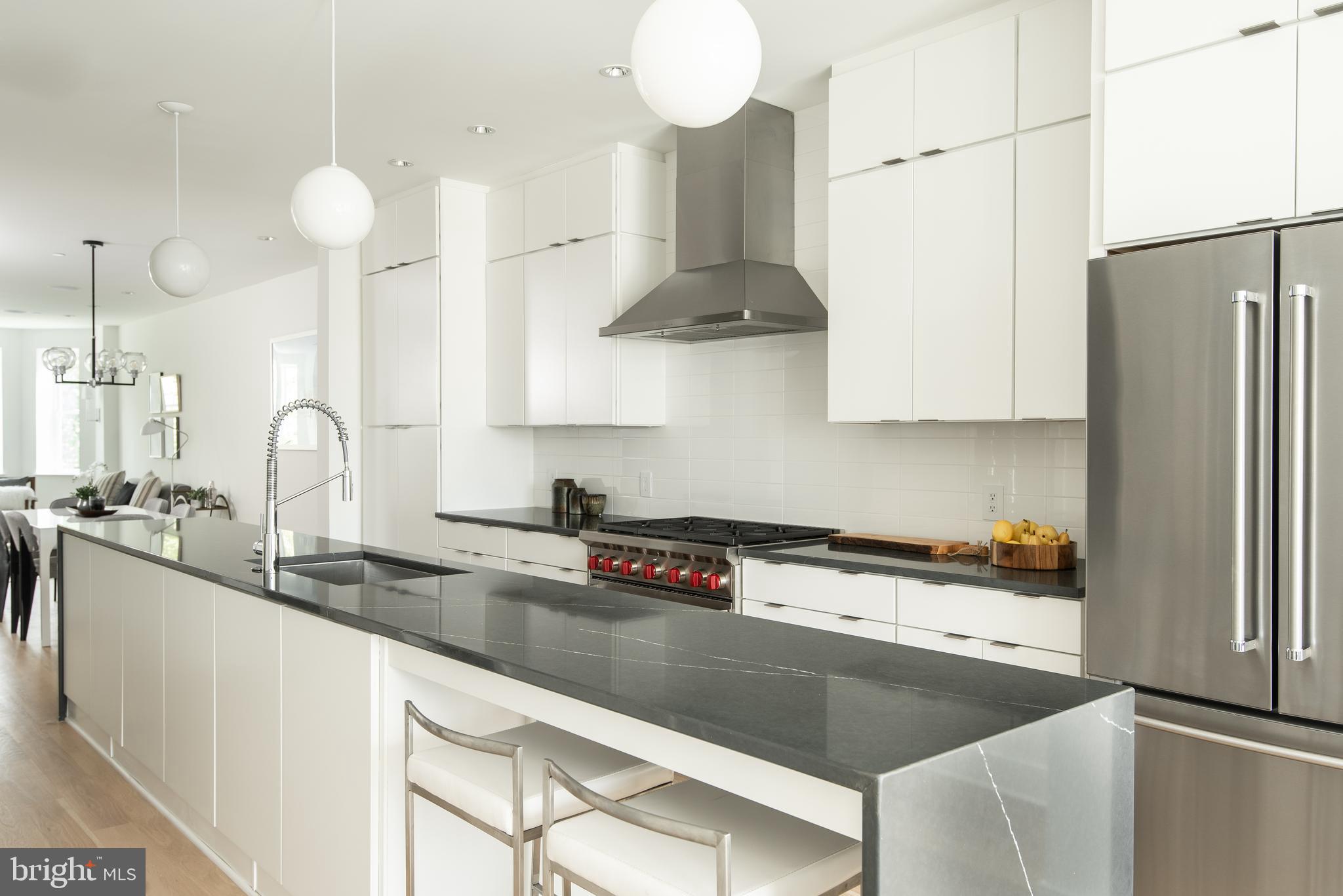 1134 Columbia Road Northwest, Unit 2 Washington, DC 20009 - Photo 8 of 26 Over-sized waterfall island