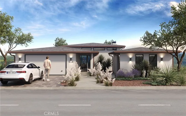 a view of a car parked on the side of a street