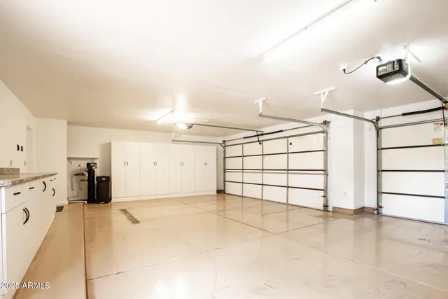 a view of a house with a backyard porch and sitting area