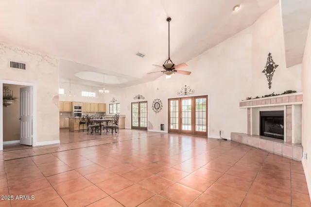 a view of a livingroom with furniture and a fireplace