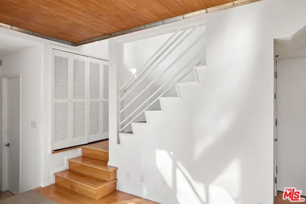 a view of entryway with wooden floor
