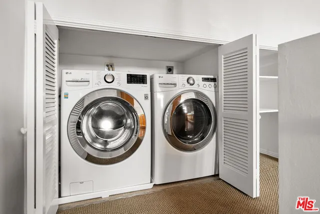a view of a kitchen with furniture and stove