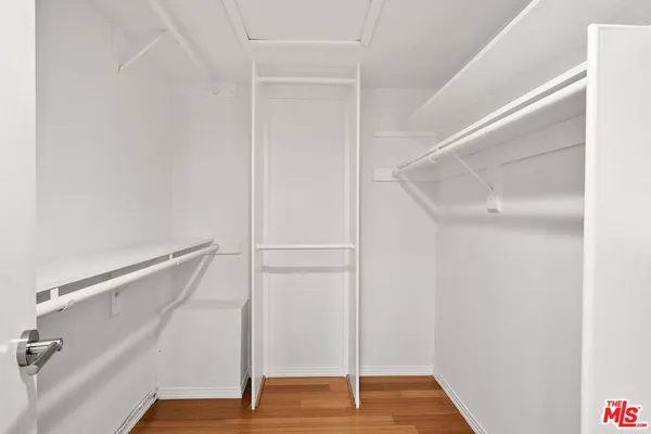 a view of an empty walk in closet