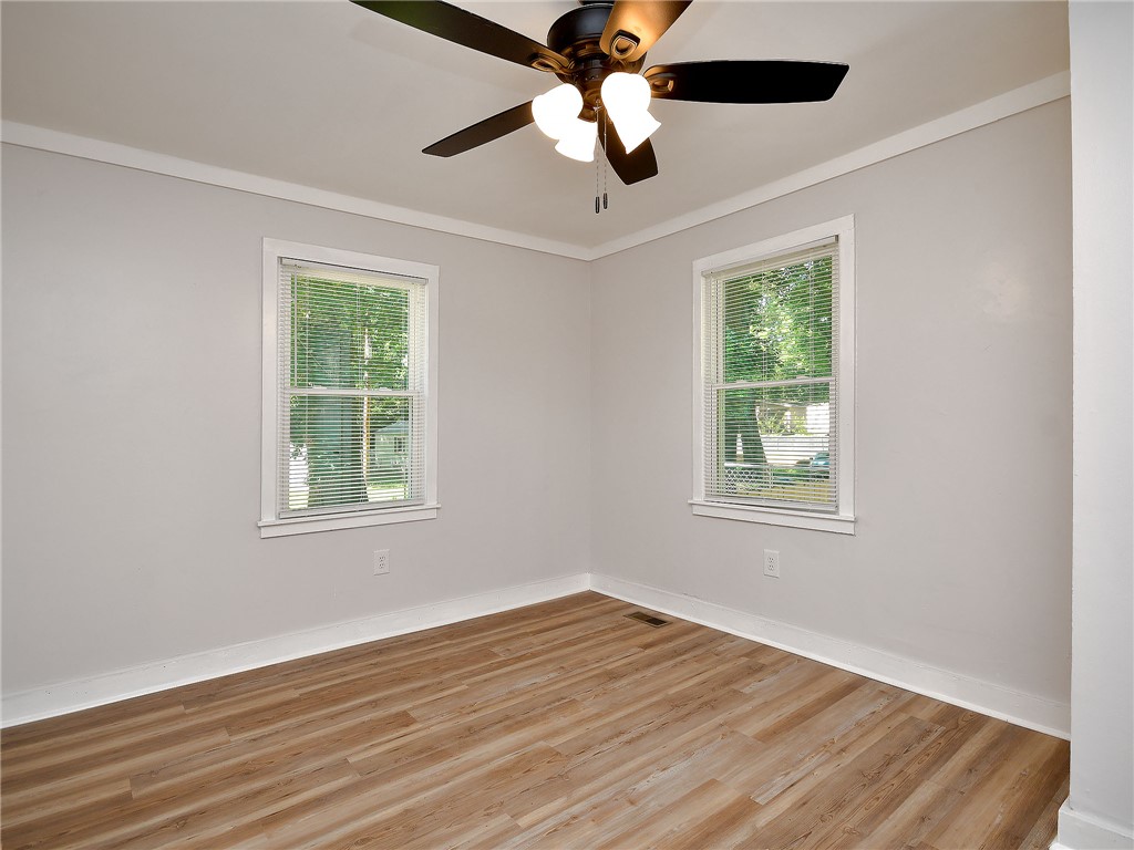 3517 Shawnee Avenue Anderson, SC 29626 - Photo 24 of 25 Hardwood-style flooring and overhead lighting complete this well-lit living area.