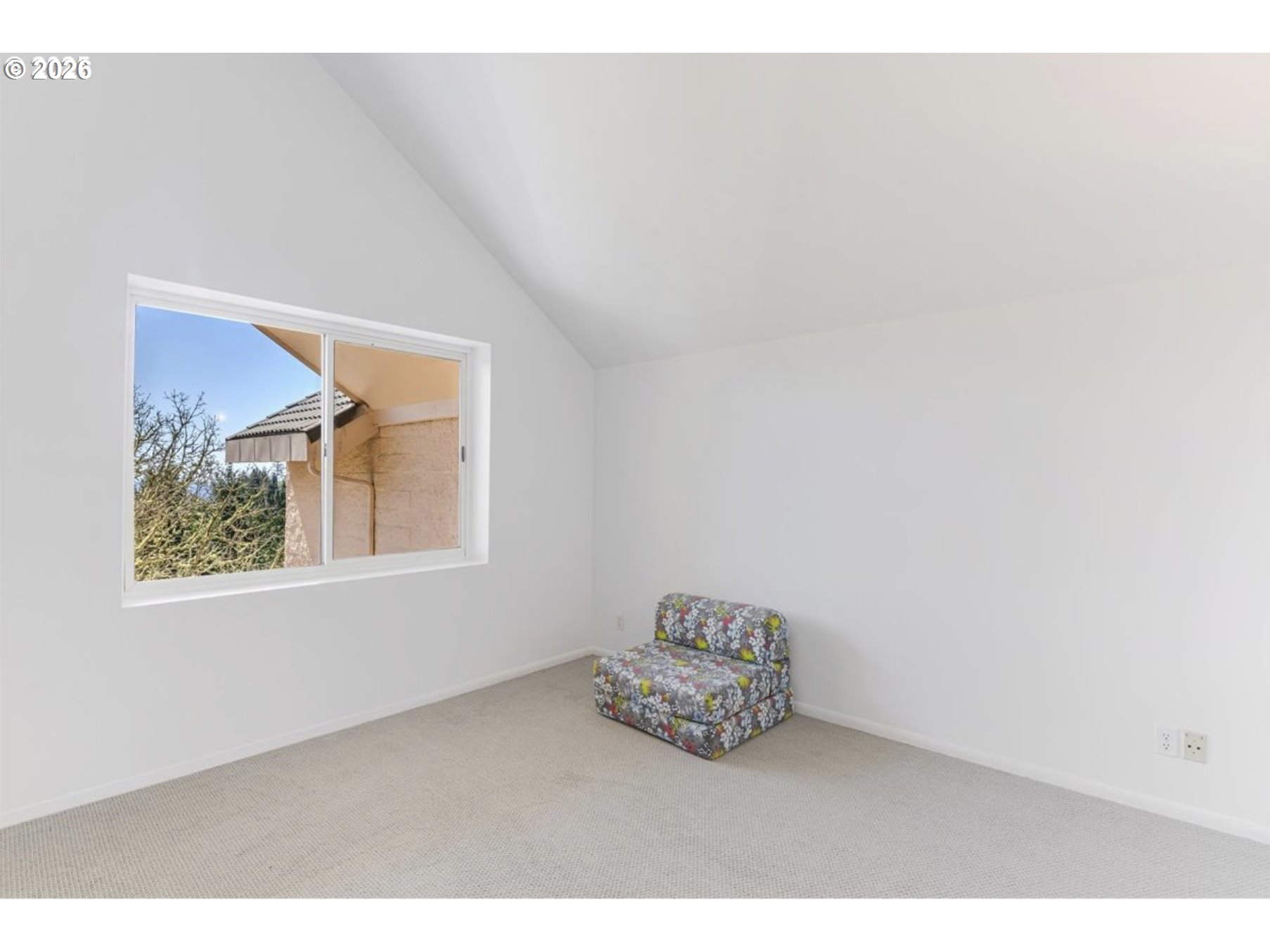 6645 West Burnside Street, Unit 550 Portland, OR 97225 - Photo 18 of 38 a big room with windows and closet