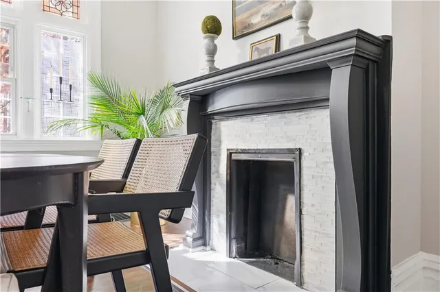 a kitchen with stainless steel appliances a stove a sink cabinets a refrigerator and a stove