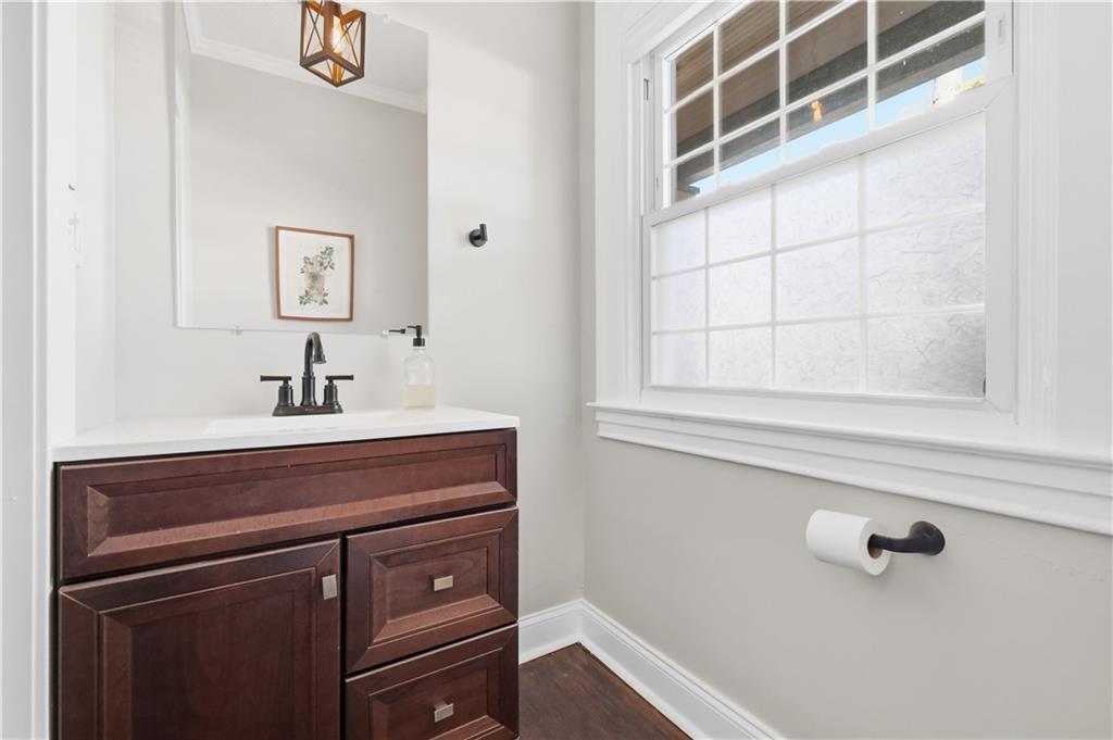 210 Elm Street Pittsburgh, PA 15218 - Photo 19 of 36 a bathroom with a sink and a mirror