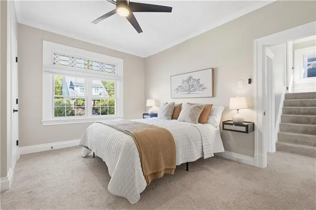 a bathroom with a toilet and a bathtub