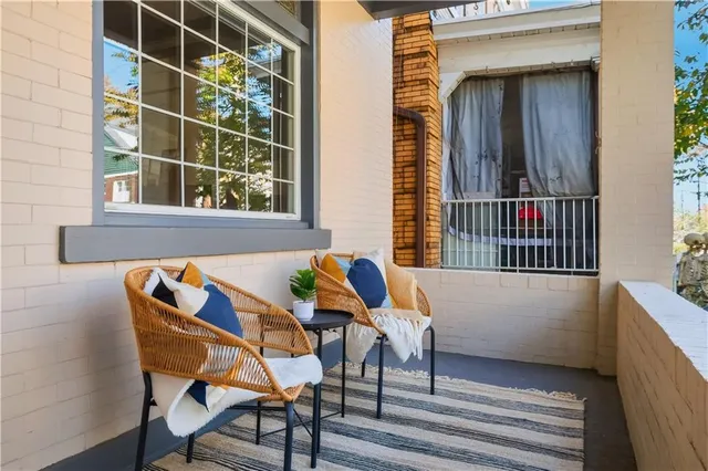 a view of a lounge chairs in the balcony