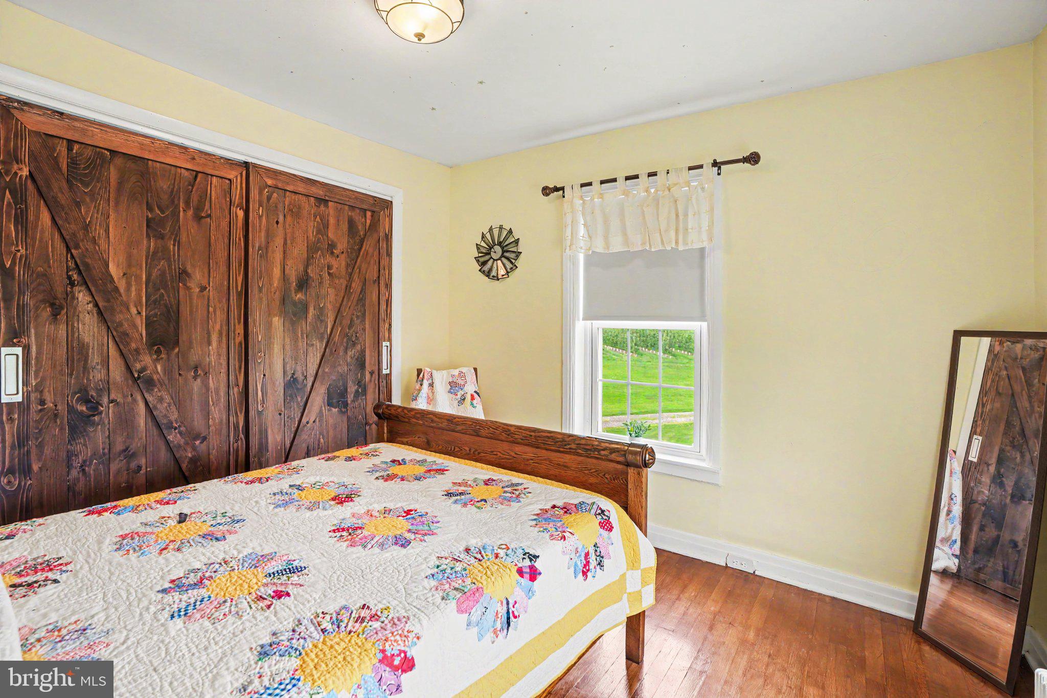 420 Carlisle Road Biglerville, PA 17307 - Photo 26 of 41 a bedroom with a bed and a window
