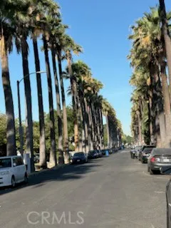 a view of a street with cars