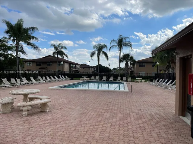 a view of a golf course with a lake