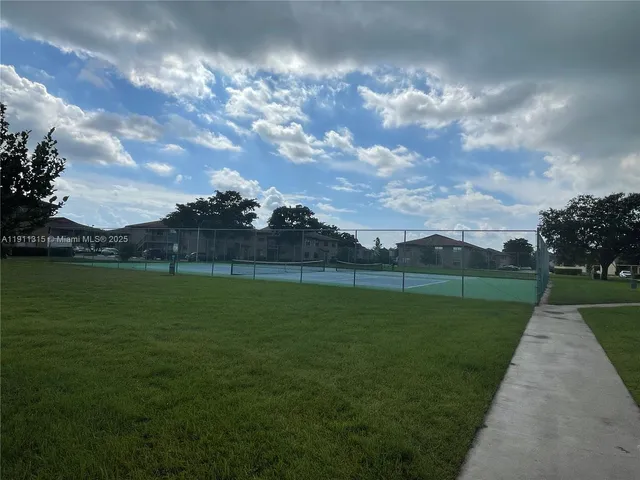 a car parked in front of a house