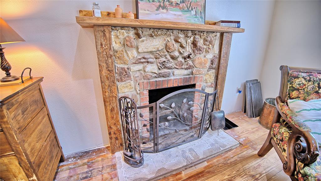 301 Spring Street Forestburg, TX 76239 - Photo 7 of 25 Wood Burning Fireplace