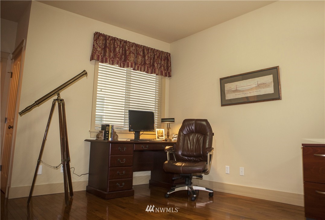 3808 186th Street Southeast Bothell, WA 98012 - Photo 12 of 25 a view of a workspace with furniture and a window