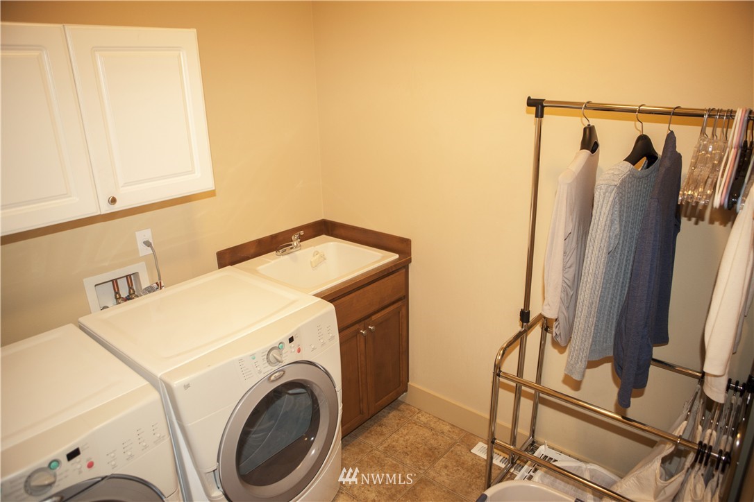 3808 186th Street Southeast Bothell, WA 98012 - Photo 13 of 25 a utility room with dryer and washer