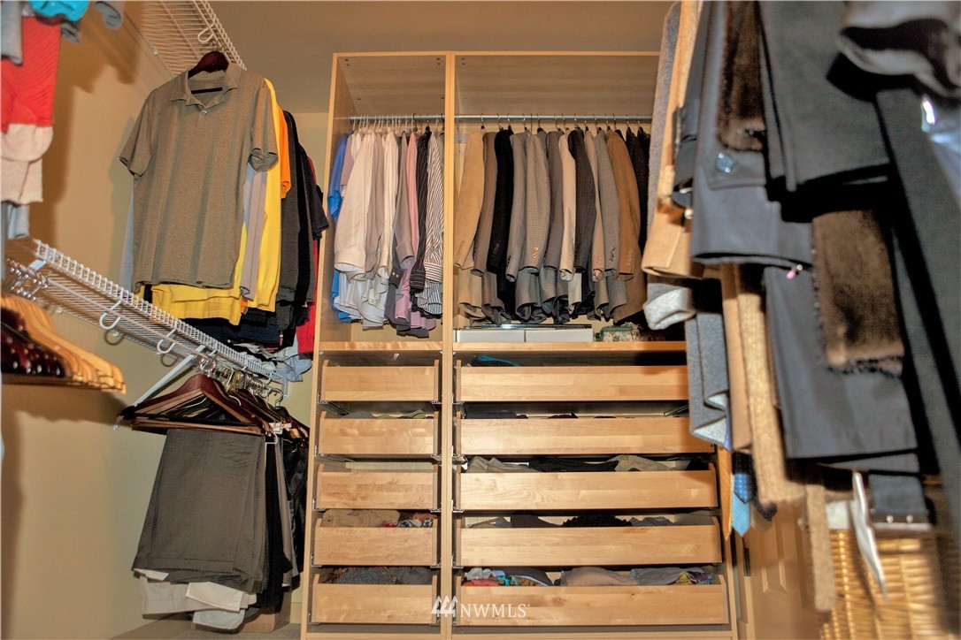 3808 186th Street Southeast Bothell, WA 98012 - Photo 19 of 25 a view of walk in closet with clothes and shoes