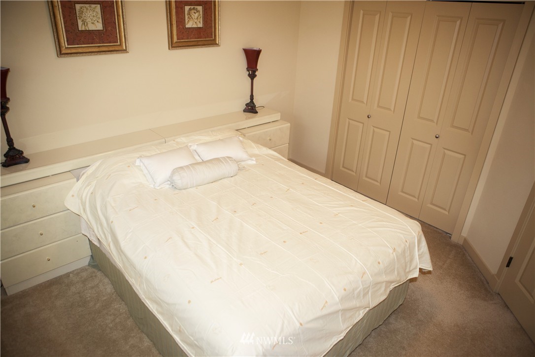 3808 186th Street Southeast Bothell, WA 98012 - Photo 22 of 25 a bed sitting in a bedroom and closet