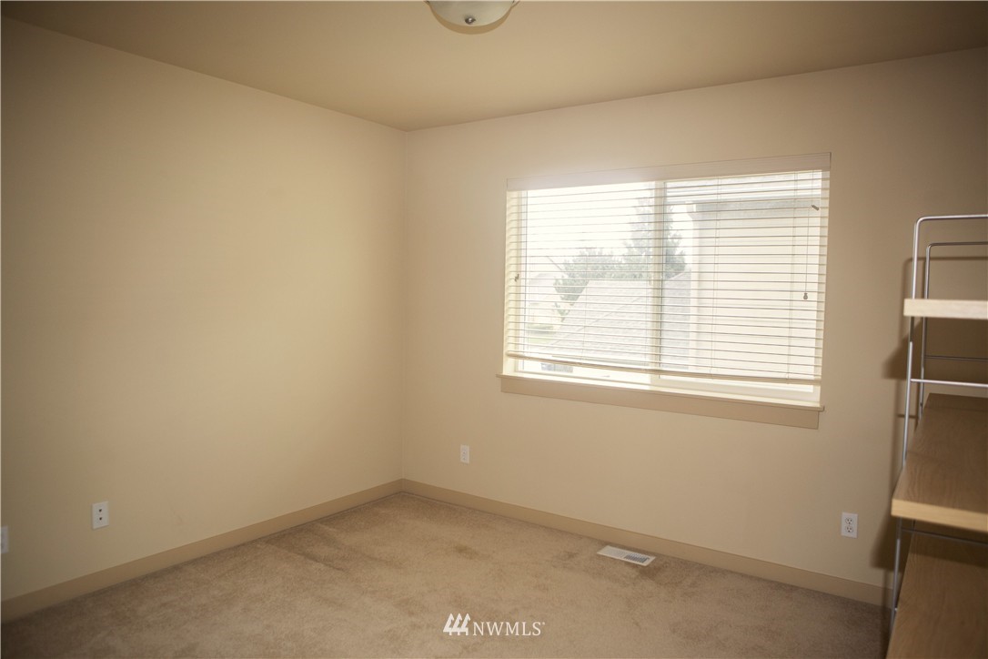 3808 186th Street Southeast Bothell, WA 98012 - Photo 23 of 25 an empty room with a window