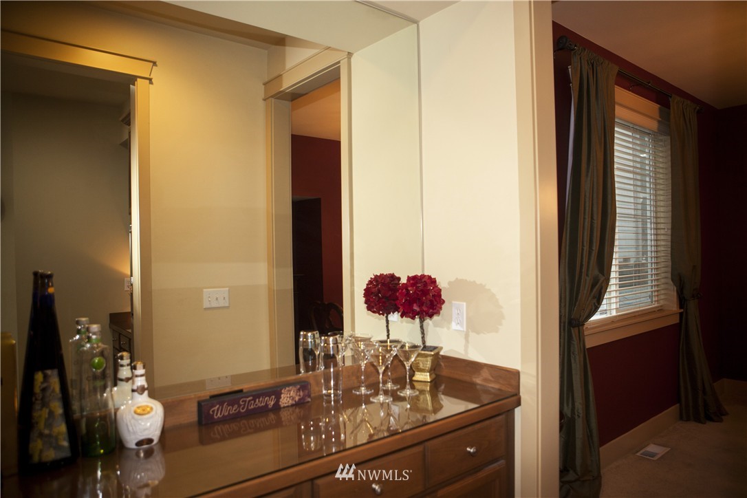 3808 186th Street Southeast Bothell, WA 98012 - Photo 6 of 25 a bathroom with a granite countertop sink and a mirror