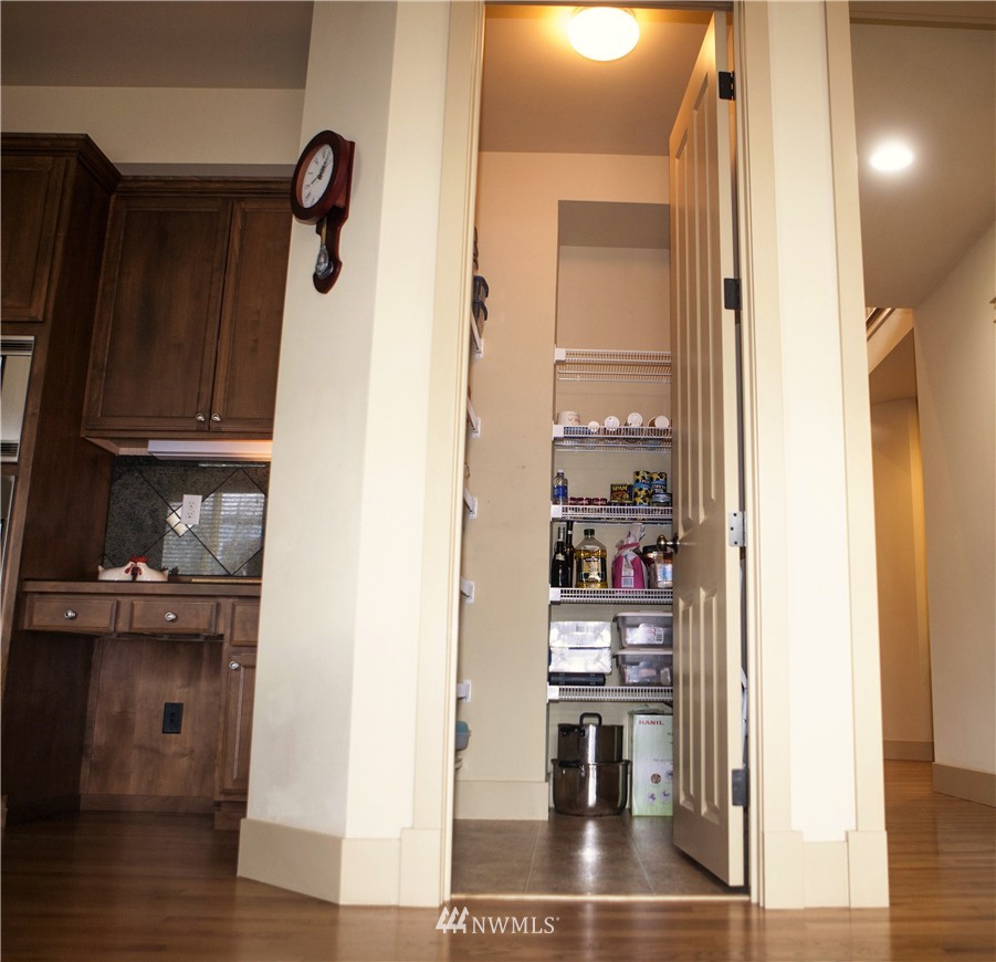 3808 186th Street Southeast Bothell, WA 98012 - Photo 9 of 25 a view of a kitchen from the hallway