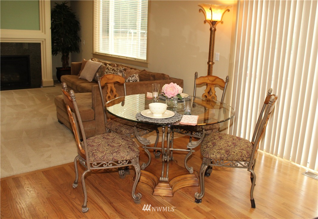 3808 186th Street Southeast Bothell, WA 98012 - Photo 10 of 25 a dining room with furniture and window