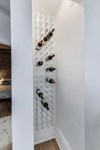 a bathroom with a sink toilet and mirror