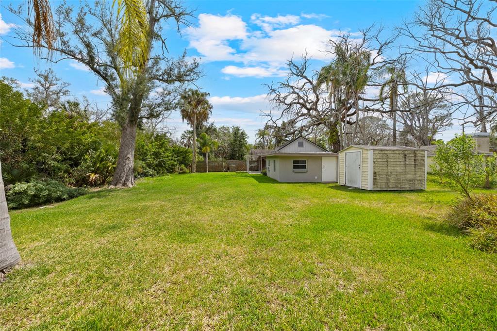 5045 Green Key Road New Port Richey, FL 34652 - Photo 25 of 32 a front view of a house with a yard