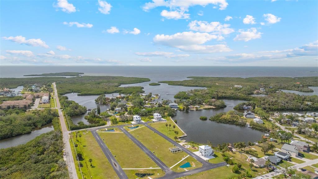 5045 Green Key Road New Port Richey, FL 34652 - Photo 31 of 32 an aerial view of residential houses with outdoor space