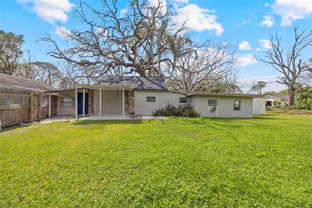 5045 Green Key Road New Port Richey, FL 34652 - Photo 10 of 32 a front view of house with yard and green space