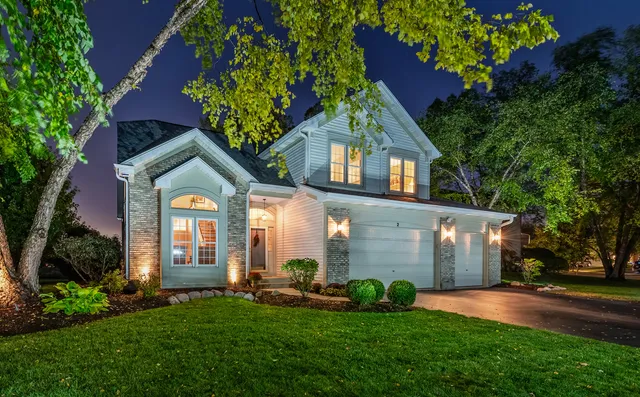 front view of house with a yard
