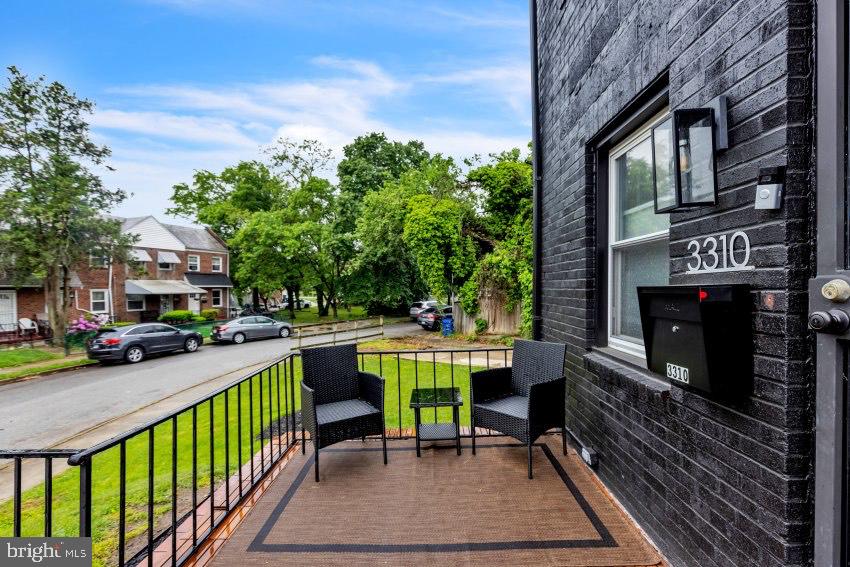 3310 Elbert Street Baltimore, MD 21229 - Photo 20 of 23 a view of a chairs and table in the balcony