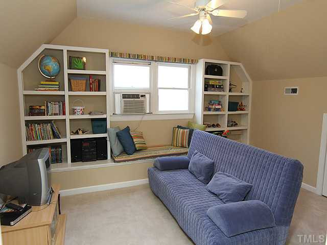 2512 Ashley Court Raleigh, NC 27607 - Photo 18 of 24 Terrific bonus room with built ins and also a closet if you should need a fifth bedroom. Space was finished and permitted - but not reflected in Wake County tax records. Square footage from appraisal. Bonus Room