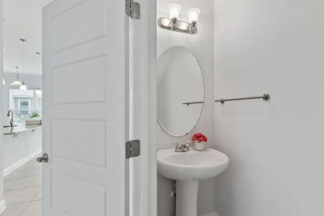 a view of an empty room with a ceiling fan