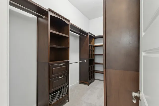 a view of a hallway with staircase