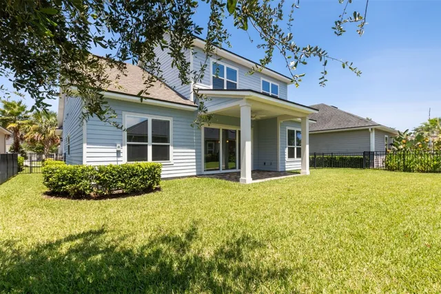 a house view with a garden space