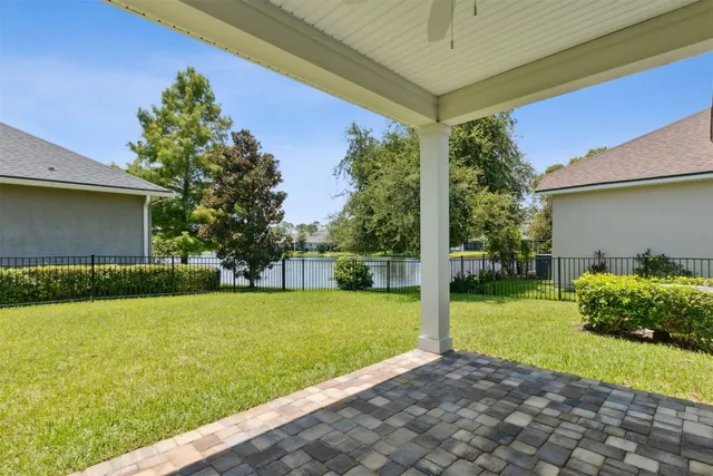a view of backyard with garden and plants