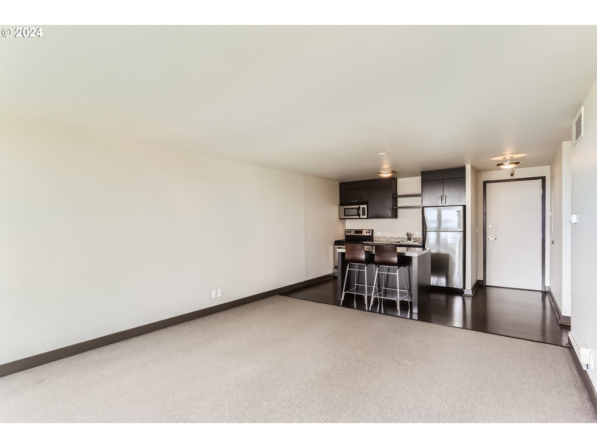 255 Southwest Harrison Street, Unit 8G Portland, OR 97201 - Photo 7 of 25 Kitchen/Living Room