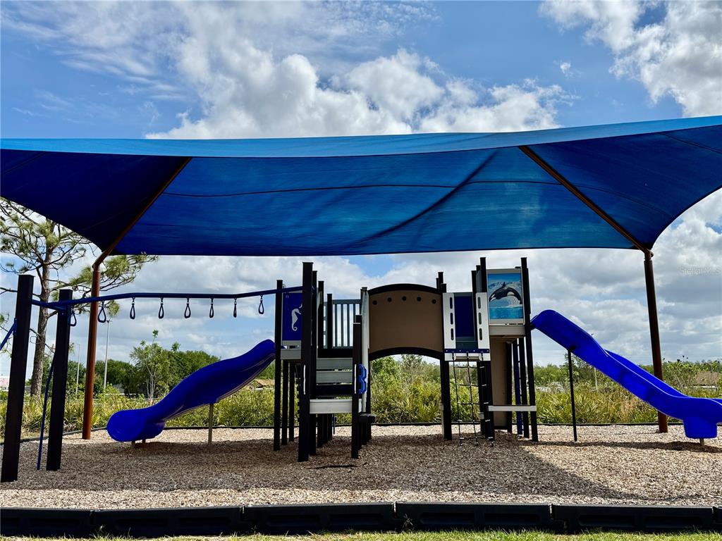 4348 Ranch House Road St. Cloud, FL 34772 - Photo 50 of 58 an outdoor space with seating