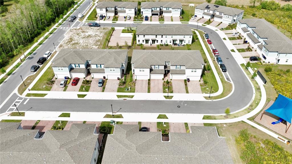 4348 Ranch House Road St. Cloud, FL 34772 - Photo 54 of 58 an aerial view of residential houses with outdoor space