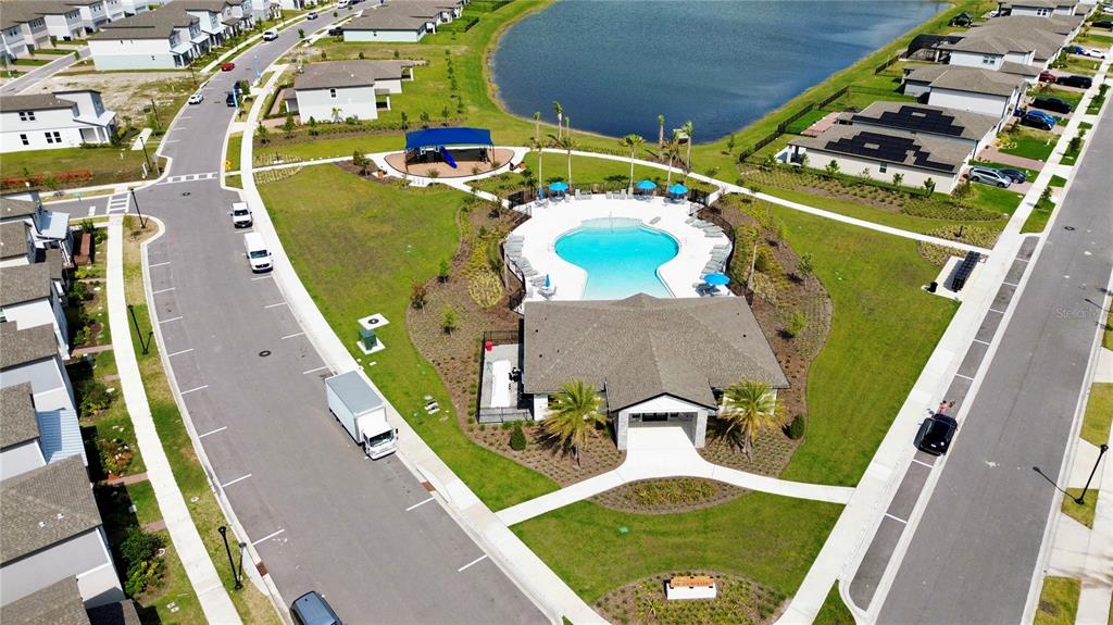 4348 Ranch House Road St. Cloud, FL 34772 - Photo 56 of 58 an aerial view of a house with a swimming pool