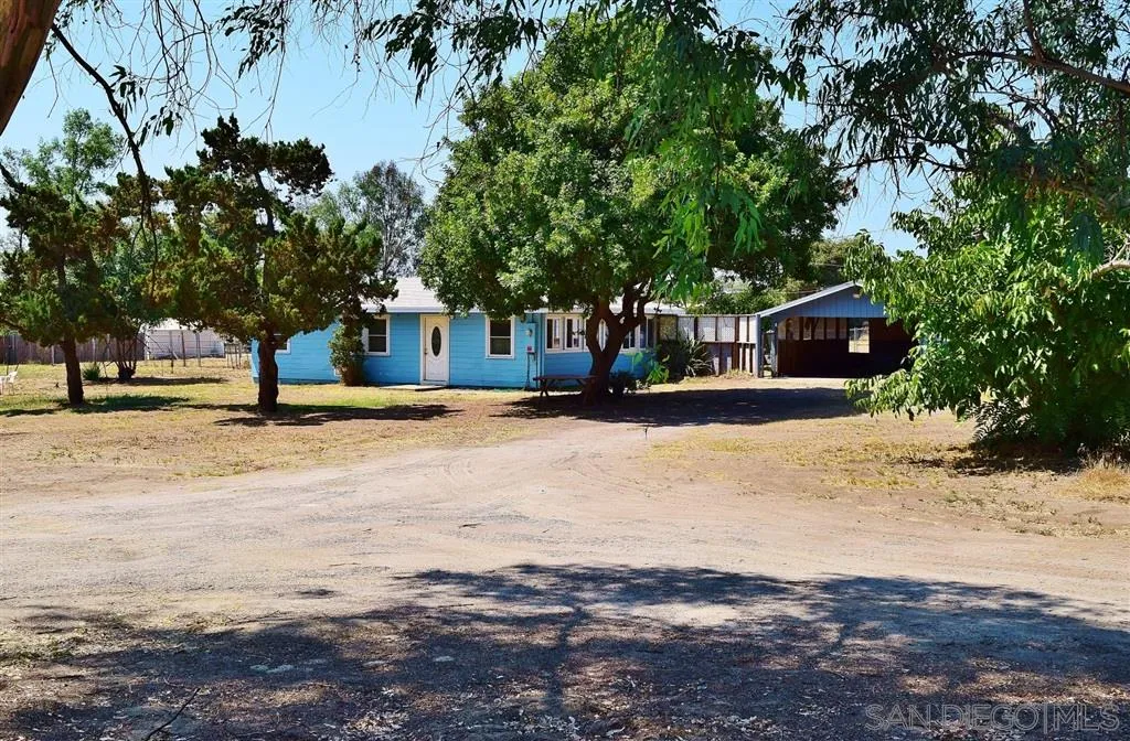 1852 Lilac Road Ramona, CA 92065 - Photo 1 of 25 a front view of a house with a yard