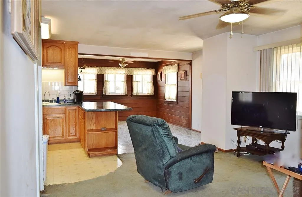 1852 Lilac Road Ramona, CA 92065 - Photo 9 of 25 a living room with furniture and a flat screen tv