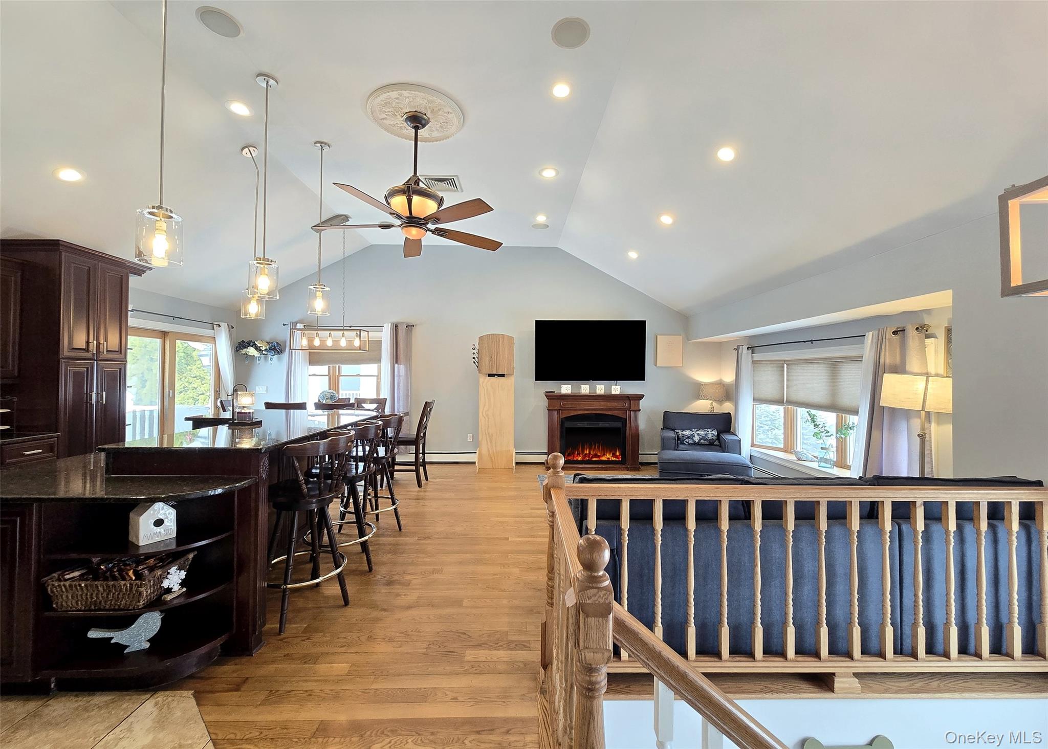 46 Harvest Lane Commack, NY 11725 - Photo 14 of 40 a view of a dining room with furniture window and wooden floor